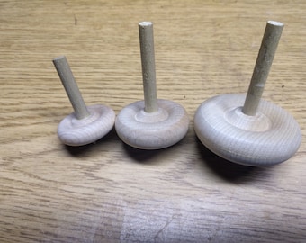 3 spinning tops