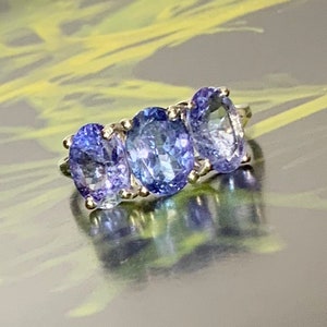 10k White Gold Natural Tanzanite (3.00 ct) 3-Stone Ring, Appraised 3,075 USD