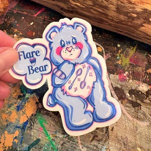 Handmade Blue Flare Bear Sticker: Sparkly Holographic Vinyl Hand-Drawn Chromic Illnesses Sticker | Hollie Day Artist
