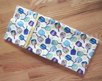 Pickleball paddles galore: bright colors on all cotton standard-queen pillowcase