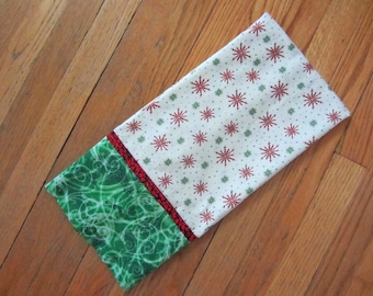 Assorted snowflake patterns on cotton standard pillowcases make for happy dreams.