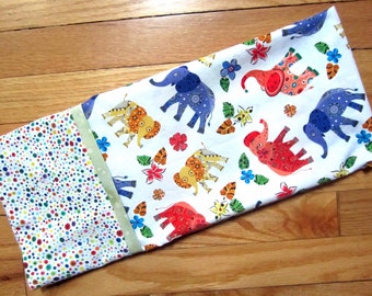 We love Elephants! Cotton standard/queen pillowcase with colorful elephant print, sure to appeal to the inner child of any age.