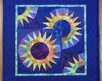 Colliding Stars: vibrant 18" quilted wall-hanging