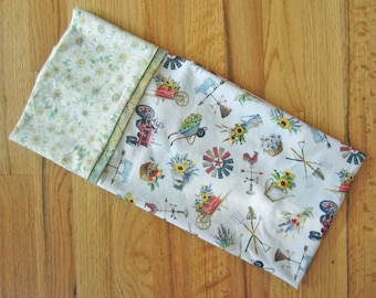 Gardening Tools: all cotton standard-queen pillowcase printed with garden tools, flowers, and sunflowers. Very cheery!