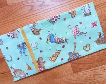 A picnic with flamingos, kangas, hippos, donkeys, more! Cotton flannel standard/queen pillowcase.