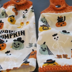 These are plush hand crocheted kitchen plush towels howdy pumpkin cowboy