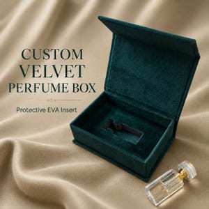 May include: A dark green velvet perfume box with an open lid and a protective EVA insert featuring a cutout for a bottle. The text CUSTOM VELVET PERFUME BOX and Protective EVA Insert are printed on the left. A small clear glass bottle sits nearby.