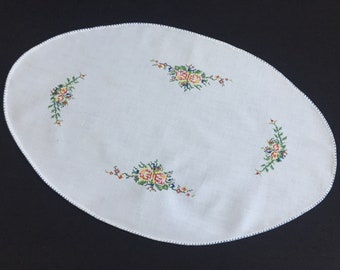 Vintage Hand Embroidered White Linen Oval Placemat Doily with Petite Point Cross Stitch Rose Bouquets Pattern and Blue Blanket Stitch Edge