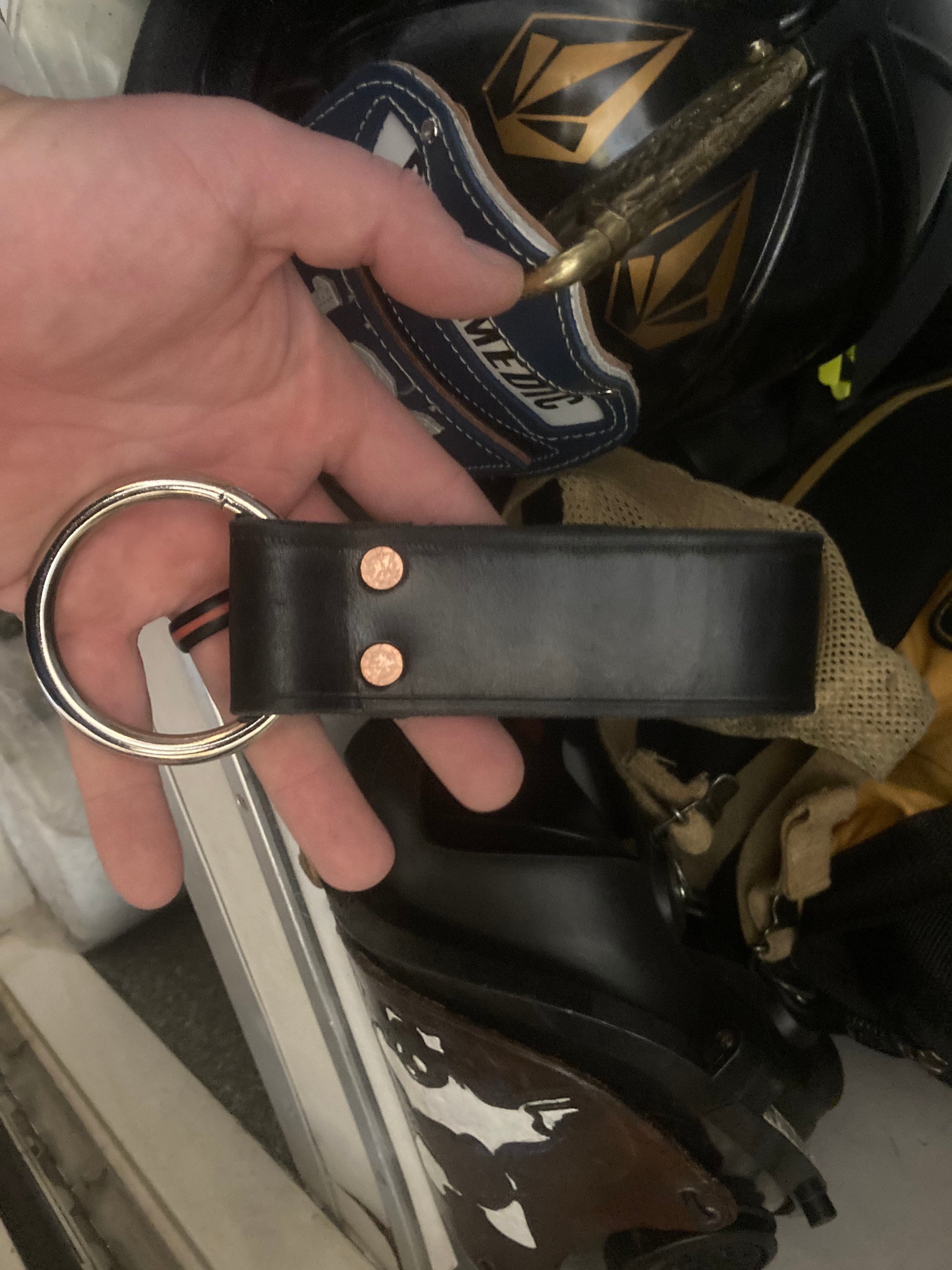 Firefighter tool ring glove ring to hang tools and glove straps from
