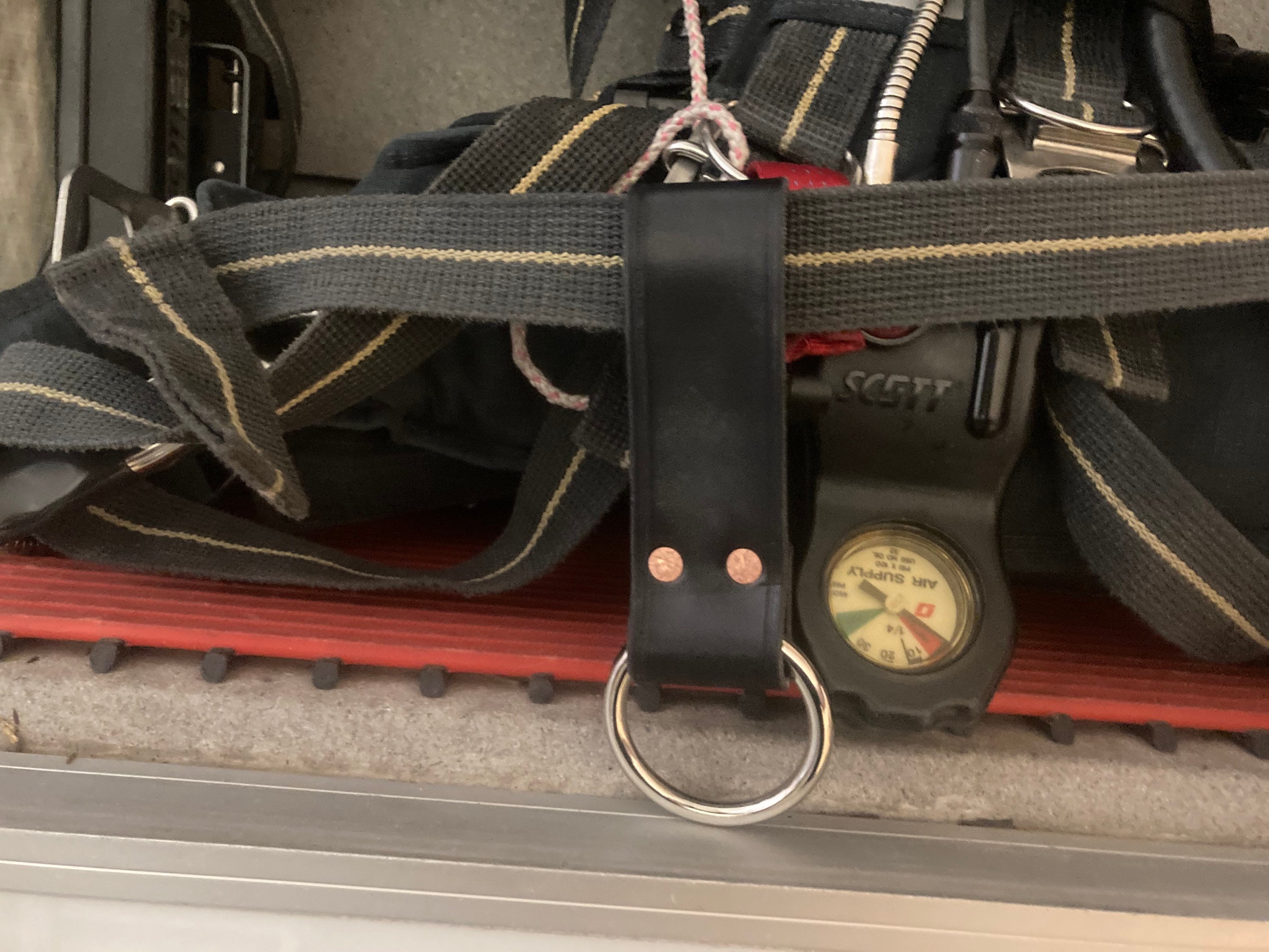 Firefighter tool ring glove ring to hang tools and glove straps from