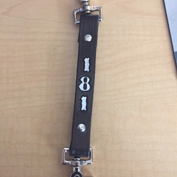 Leather firefighter sway strap for radio straps