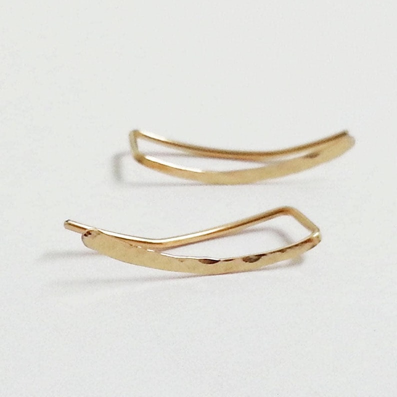 Pair of 2cm hammered 14K gold filled ear climber earrings on white background, thin curved gold climbers for pierced ears