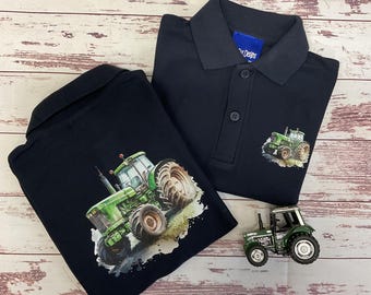 kids polo with green tractor print , on front and back . Farm clothing , navy