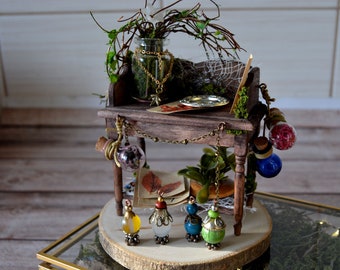 Green witch fairy table miniature, Alchemy table with plants, herbal prints and potions, Fairy core miniature