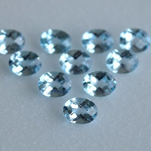 Natural Blue Topaz Faceted Oval with Checker Cut Over the top. Size 9x7 mm, 7x5 mm. Fine Quality Gems. Price per piece