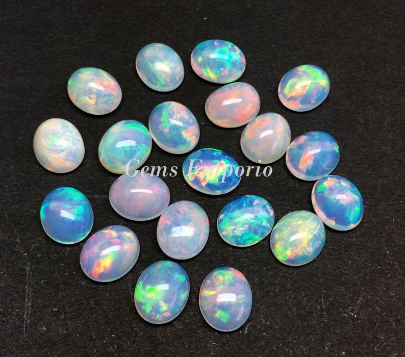 ETHIOPIAN WELO OPAL 12x10 MM OVAL CUT MULTI FIRE FACETED CALIBRATED ALL NATURAL 