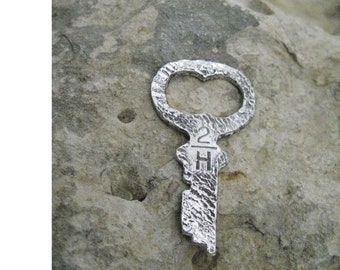 Sterling vintage Infinity Key