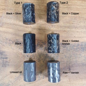 May include: Five metal knobs in different finishes, including black, silver, copper, and golden bronze. The knobs are labelled with their finish and type, and the text "Type 1" and "Type 2" is visible. The knobs are arranged in two rows of three, with the top row labelled "Type 1" and the bottom row labelled "Type 2".