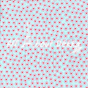 May include: A light blue background is covered with a pattern of red hearts and pink floral accents. The words "All about Dekka" are written in white script, with a white Eiffel Tower graphic.