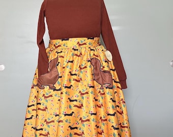 Lindy Bop Raffrock mit Dackelmotiv und Taschen. Größe 22