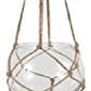 May include: A hanging planter made of natural rope with a clear glass globe. The planter has a long tassel at the bottom.