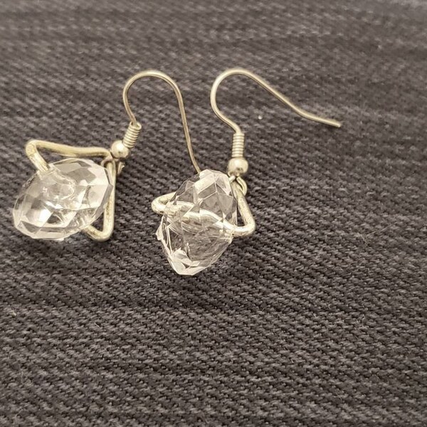 New handmade Crystal Earrings.  Very light weight resin crystal cradled with a sliver plated triangle. Nickel free hook. Ships FREE in USA