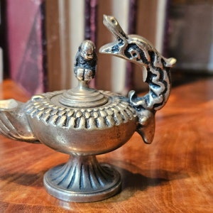 Antique Bronze Oil Lamp with dragon handle and figure on Lid. In Good condition. Ships FREE in the USA