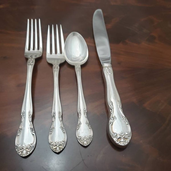 Vintage Gorham New Elegance Silverware set for 4 & Serving Peices. In Very Good Condition. Polished and ready to use.  Ships FREE in USA.