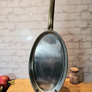 European Large Oval Saute Copper Pan. Brass handle. Very good condition. High Quality. Stovetop, Oven. Cleaned, ready to use. Ships FREE USA