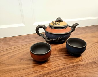 Vintage Hand Crafted Chinese Zisha tea set for 2. Comes with removable strainer. Great Condition. Ships FREE in USA