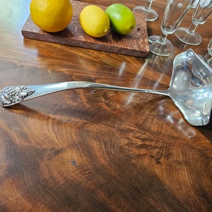 Vintage  One Peice Large Silver Ladle. Use for serving Drinks, Soups, Stews. Good weight. Great Condition. Polished. Ships FREE in USA