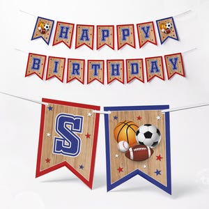 A printable sports-themed birthday banner with red, white, and blue colors. The banner says "Happy Birthday" and includes 2 individual flags.