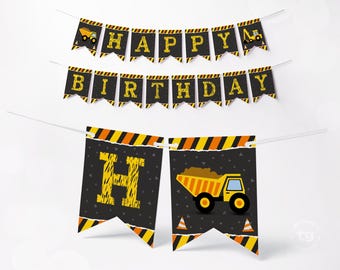 May include: A construction-themed party banner set featuring black pennants with yellow textured lettering spelling HAPPY BIRTHDAY. The design includes yellow and black hazard stripes, illustrations of dump trucks, excavators, and orange traffic cones.