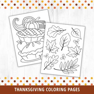 May include: Two black and white coloring pages for Thanksgiving. One page features a pie, apple, and cornucopia. The other page features a variety of leaves.