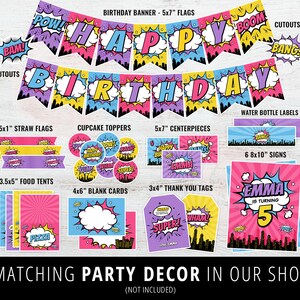 May include: A set of printable party decorations for a superhero themed birthday party. The set includes a banner, cupcake toppers, food tents, straw flags, centerpieces, thank you tags, blank cards, water bottle labels, and signs. The decorations feature a pink, yellow, and blue color scheme with a comic book style design. The text on the banner reads "Happy Birthday".