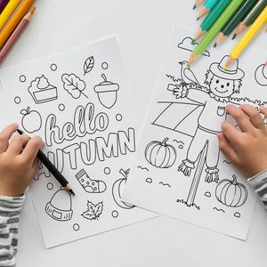 May include: Two coloring pages featuring autumn themes. The first page says "hello autumn" with a pie, a leaf, and a pumpkin. The second page features a scarecrow with a bird, pumpkins, and the text "Happy Fall".