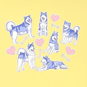Puede incluir: Seis pegatinas de perros husky azules y blancos con corazones y huesos sobre un fondo amarillo.