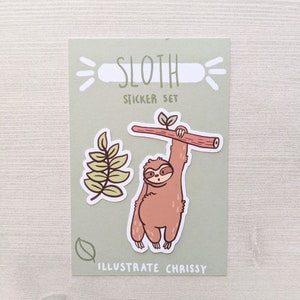 May include: A sticker set featuring a sloth hanging from a branch, with green leaves. The sticker sheet is green and has the text "Sloth Sticker Set" and "Illustrate Chrissy".