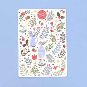 May include: A white background with a repeating pattern of blue and green leaves, red berries, and small white flowers. The text "Illustrate Christmas" is in a red circle at the top of the image.