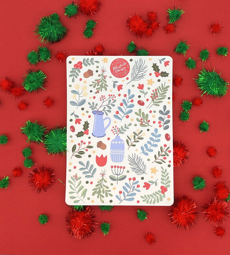 May include: A white sticker with a festive Christmas design featuring a blue pitcher, a blue vase, red berries, green leaves, and the text "Allegraite Christmas".