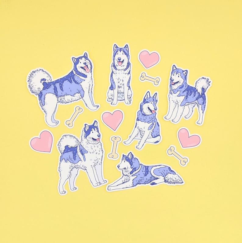 Puede incluir: Un conjunto de pegatinas de perros husky azules y morados con corazones y huesos sobre un fondo amarillo.