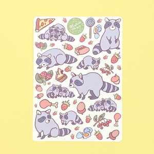May include: A sticker sheet featuring cartoon raccoons and various food items like pizza, strawberries, and a lollipop. The raccoons are in different poses, and the sheet has a light background with the text "Illustrate Chrissy".