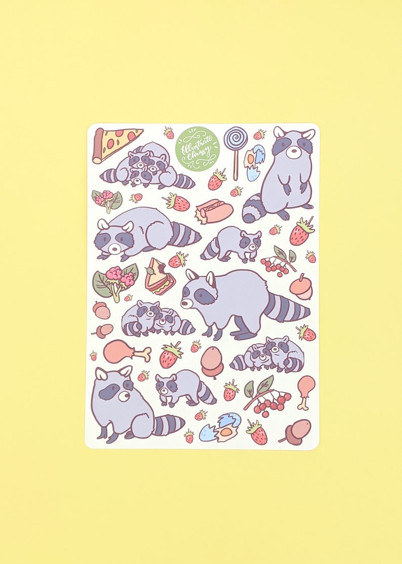May include: A sticker sheet featuring cartoon raccoons and various food items like pizza, strawberries, and a lollipop. The raccoons are in different poses, and the sheet has a light background with the text "Illustrate Chrissy".