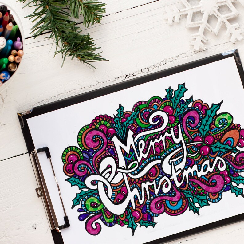 May include: A printable coloring page featuring a colorful, intricate doodle design of the words "Merry Christmas".