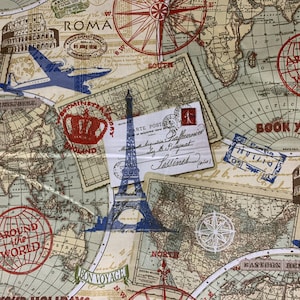 May include: A fabric with a travel theme featuring a world map, compass roses, and vintage stamps. The design includes images of the Eiffel Tower, a biplane, and the Colosseum, with text that reads "ROMA" and "AROUND THE WORLD."