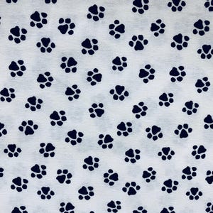 Paw prints on white fabric, dog fabric, puppy fabric, animal fabric, pets, cats, cotton fabric