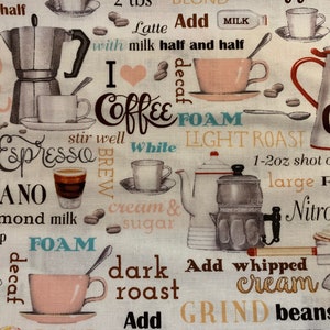 May include: A white fabric background with a colorful pattern of coffee-related words and images. The words include "Espresso", "Americano", "Latte", "I love Coffee", "Foam", "Light Roast", "Dark Roast", "Grind Beans", "Nitro Cold", "Flat White", "Decaf", "Brew", "Add Whipped Cream", "1-2 oz shot of espresso", "2 tbs of syrup", "with almond milk", "with milk", "half and half", "cream and sugar", "Cold", "Large", "and "Cold". The images include coffee pots, coffee cups, coffee beans, and a heart.