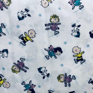 Charlie Brown Peanuts Winter Ice skating fabric, cartoon fabric, licensed fabric, Peanuts Gang fabric, Snoopy fabric, holiday fabric, winter