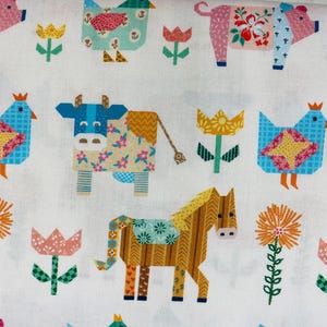 May include: White fabric with a repeating pattern of farm animals and flowers. The animals include cows, pigs, chickens, and a horse, all in a patchwork style. The flowers are in shades of yellow, pink, and orange.