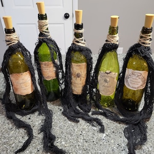 Potion bottles, Halloween potions, wine bottle potions, light up potion bottles, handmade potion bottles, Halloween decor potion bottles